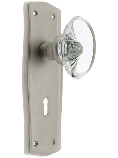 Prairie Plate with Oval Clear Crystal Knob with Keyhole in Satin Nickel.